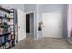 This bedroom features neutral walls, carpet, and doors for privacy at 18069 W Tina Ln, Surprise, AZ 85387
