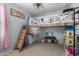 Bedroom with a lofted bed and storage beneath, perfect for  at 18069 W Tina Ln, Surprise, AZ 85387