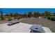 Community area featuring cornhole boards on concrete and a fenced perimeter at 18069 W Tina Ln, Surprise, AZ 85387