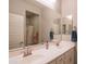 Bathroom with dual vanity with ample counter space and a shower at 18187 W Via Montoya Dr, Surprise, AZ 85387
