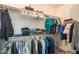 Walk-in closet with clothing racks and shelves for organized storage solutions at 18187 W Via Montoya Dr, Surprise, AZ 85387