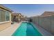 A private swimming pool with plenty of room for outdoor furniture and lounging at 18187 W Via Montoya Dr, Surprise, AZ 85387