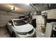 Spacious garage with ample storage, shelving, and room for vehicle parking at 18542 W Luke Ave, Litchfield Park, AZ 85340