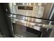 Close up view of the stainless steel oven in the kitchen at 18542 W Luke Ave, Litchfield Park, AZ 85340
