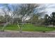 Scenic park view featuring mature trees, grassy areas, and peaceful surroundings at 18542 W Luke Ave, Litchfield Park, AZ 85340