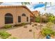 Backyard featuring desert landscaping with a peek of the covered patio at 18886 N 77Th Ave, Glendale, AZ 85308
