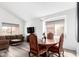 Open-concept living and dining area featuring modern lighting and comfortable furnishings at 22236 N 48Th St, Phoenix, AZ 85054