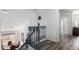 Elegant staircase with modern gray railings, white walls, leading to a bright and open living space at 22236 N 48Th St, Phoenix, AZ 85054
