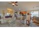The living room integrates seamlessly with the kitchen and dining areas, creating a cohesive living space at 2453 E Hancock Trl, Casa Grande, AZ 85194