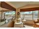 Comfortable sitting area with views of the desert landscape through large windows at 2453 E Hancock Trl, Casa Grande, AZ 85194