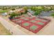 Aerial view of tennis and pickleball courts within a residential community at 2453 E Hancock Trl, Casa Grande, AZ 85194