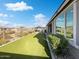Backyard featuring artificial grass, a gazebo, and privacy fence at 2526 E Novak Way, Phoenix, AZ 85042