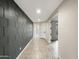 Inviting hallway with decorative wall, leading to various rooms in the home at 2526 E Novak Way, Phoenix, AZ 85042
