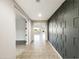 Hallway with tile floor and a decorative wall, leading into the home at 2526 E Novak Way, Phoenix, AZ 85042