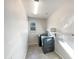 Laundry room with a window and side by side washer and dryer at 2526 E Novak Way, Phoenix, AZ 85042