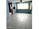 Bright living room featuring tile floors at 2530 W Berridge Ln # E102, Phoenix, AZ 85017