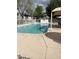 Relaxing community pool area with clear blue water at 2530 W Berridge Ln # E102, Phoenix, AZ 85017