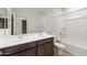 Bathroom featuring double vanity with modern faucets, a tub, and toilet at 2658 N Coronado Dr, Florence, AZ 85132
