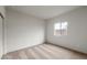 Carpeted bedroom featuring a window letting in plenty of natural light at 2658 N Coronado Dr, Florence, AZ 85132