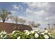 Beautiful Anthem community sign surrounded by lush landscaping and a decorative brick wall at 2658 N Coronado Dr, Florence, AZ 85132