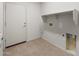 Laundry room featuring utility sink and available washer and dryer hookups at 2658 N Coronado Dr, Florence, AZ 85132