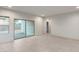 Spacious living room with tiled floors, lots of natural light, and a backyard view at 2658 N Coronado Dr, Florence, AZ 85132