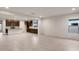Open-concept living space with a kitchen and a large window offering natural light at 2658 N Coronado Dr, Florence, AZ 85132