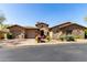 Attractive single Gathering home with desert landscaping, three-car garage, and stone accents at 27708 N 110Th Pl, Scottsdale, AZ 85262