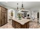 Gourmet kitchen features a large island, stainless steel appliances, and an open floor plan at 27708 N 110Th Pl, Scottsdale, AZ 85262