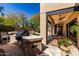 Beautiful pool in a desert landscaped backyard, featuring a built-in grill and seamless indoor outdoor living at 27708 N 110Th Pl, Scottsdale, AZ 85262