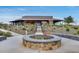 Exterior view of the community building with a landscaped desert garden and mountain backdrop at 32366 N 133Rd Ln, Peoria, AZ 85383