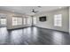 Bright living room with large windows providing natural light and an open view at 32366 N 133Rd Ln, Peoria, AZ 85383
