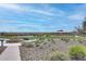 Community park with playground, basketball court, landscaped areas, and desert mountain views at 32366 N 133Rd Ln, Peoria, AZ 85383
