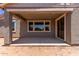 Covered patio with concrete flooring and views of the backyard at 40499 W Michaels Dr, Maricopa, AZ 85138