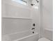 Bright bathroom featuring a tub with white subway tile surround at 40499 W Michaels Dr, Maricopa, AZ 85138