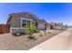 Attractive single-Gathering house with low-maintenance landscaping and a two-car garage at 40499 W Michaels Dr, Maricopa, AZ 85138