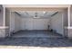 Spacious two-car garage with ample storage space and a clean interior at 40499 W Michaels Dr, Maricopa, AZ 85138