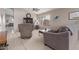 Inviting living room featuring a ceiling fan and neutral decor at 42266 W Sparks Dr, Maricopa, AZ 85138