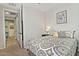 Comfortable bedroom with a cactus print and hallway view at 4361 N Petersburg Dr, Florence, AZ 85132