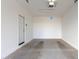 Empty garage features a concrete floor, and a white painted wall at 4746 S Ferric --, Mesa, AZ 85212