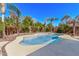 Sparkling pool surrounded by lush tropical landscaping creates a backyard paradise at 4914 E Palm Beach Dr, Chandler, AZ 85249