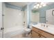 Bathroom featuring a bathtub with shower, toilet, vanity with cabinets and mirror at 5303 N 7Th St # 109, Phoenix, AZ 85014