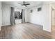 Bright, spacious bedroom with wood-style flooring, neutral walls, and natural light at 5303 N 7Th St # 109, Phoenix, AZ 85014