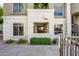 Inviting building entrance with manicured bushes, easy access and a clean and well-kept walkway at 5303 N 7Th St # 109, Phoenix, AZ 85014