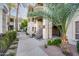Well-maintained building exterior featuring clean lines, balconies, and lush landscaping at 5303 N 7Th St # 109, Phoenix, AZ 85014