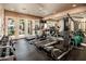 Community fitness center with treadmills, elliptical machines, weights, and mirrored walls at 5303 N 7Th St # 109, Phoenix, AZ 85014