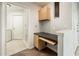 Office nook area featuring built-in desk and cabinetry at 5303 N 7Th St # 109, Phoenix, AZ 85014
