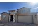 Charming single-Gathering home with a two-car garage, stone accents, and a well-maintained yard at 5405 W Jackalope Ln, Laveen, AZ 85339