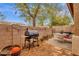 Outdoor backyard with a grill and seating area, ideal for outdoor cooking and gatherings at 5415 E Mckellips Rd # 24, Mesa, AZ 85215