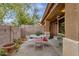 Outdoor patio with seating provides a tranquil retreat and garden view, great for relaxation at 5415 E Mckellips Rd # 24, Mesa, AZ 85215